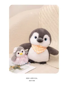 Cute penguin plush toy couple set with bib and dress, ideal for desktop decor and companion.