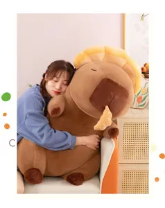 Cute capybara plush toy holding bread, soft stuffed doll lifestyle scene detail view.
