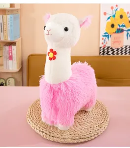 Cute pink alpaca plush toy detail view, soft fluffy stuffed animal doll for room desk decor.