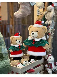 Cute Christmas teddy bear plush toy wearing Santa hat and cape for holiday gift decor.