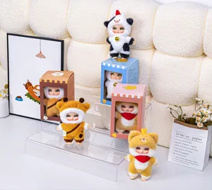 Ensemble de poupées mystères en peluche vinyle animal mignon avec costume de vaches.