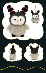 Detail view of cute penguin plush keychain with fuzzy texture, red-striped ears and metal ring.