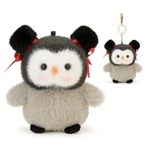 Cute penguin plush keychain pendant with red ribbon bow, soft fluffy plush bag charm gift.