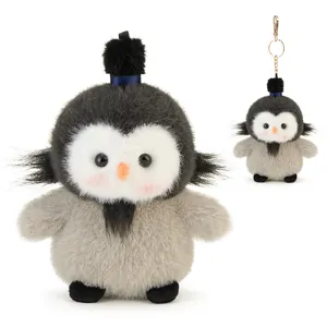 Cute creative plush penguin keychain, fluffy bag charm, stylish animal keyring gift for kids.