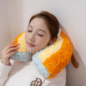 Soft plush u-shaped neck pillow detail shot, featuring vibrant orange, yellow and blue layers.