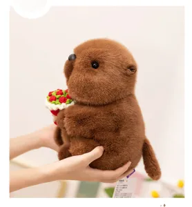 Detailed shot of brown plush groundhog toy holding a cute red flower bouquet, soft texture.