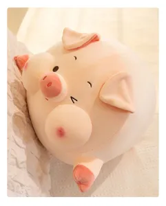 Cute chubby pig plush toy detail, soft sleeping pillow texture, warm bedroom scene close-up.
