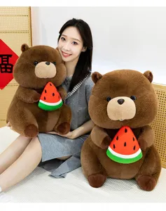 Cute brown groundhog plush toy holding watermelon slice, soft huggable pillow detail.