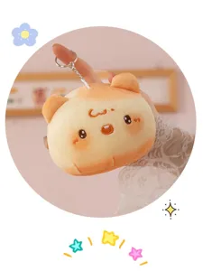 Cute plush bread dumpling keychain detail, soft texture and exquisite embroidery expression.