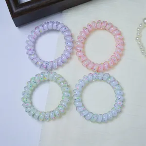 Colorful telephone wire hair ties with cute dot patterns, durable and high elasticity.