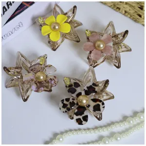 Acetate star flower hair claw clips for women, stylish shark hair clips with faux pearls.