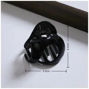 Black irregular hair claw clip medium shark clip for half up hairstyles and buns everyday use.