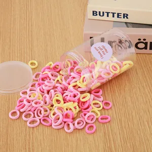 Cute candy color seamless hair ties for kids, soft elastic hair rubber bands detail.