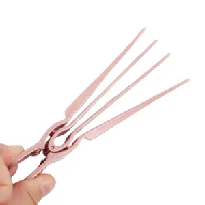 Pink hair root volume clip for women, multi-prong bang styling tool for natural fluffy hair.