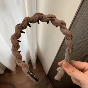 Brown braided hair hoop headband with inner teeth, versatile twist hair accessory for daily wear.