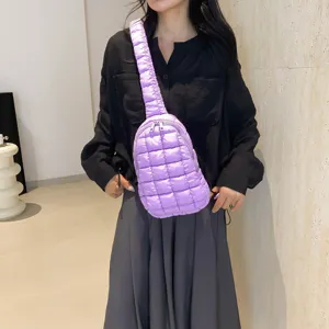 Stylish quilted puffer crossbody sling bag for women, lightweight purple chest bag daily.