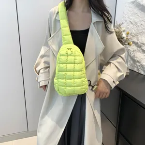 Neon green quilted puffer sling bag for women, trendy lightweight crossbody chest bag.