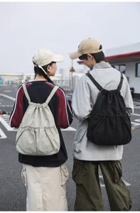 Sac à dos en nylon à cordon décontracté pour hommes et femmes, grande capacité.