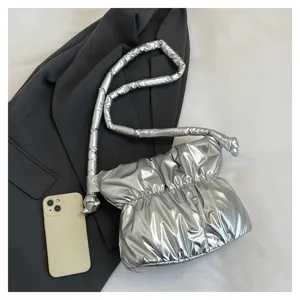 Silver metallic puffer shoulder bag, stylish pleated nylon bucket bag for women daily use.