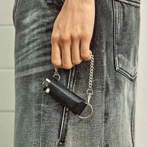 Leather lighter case with metal chain, stylish portable PU protective cover accessory.