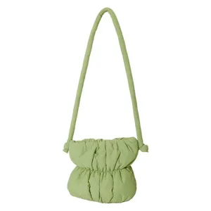 Green quilted shoulder bag for women, stylish puffy nylon dumpling bag with pleated design.