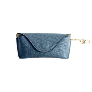 Simple leather glasses storage case detail showing the portable anti-lost chain and texture.