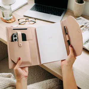 PU leather trifold A5 notebook folder multifunctional organizer with phone pocket and pen holder.