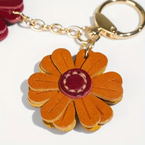 Portachiavi fiore margherita in pelle grazioso borsa fascino anello metallo oro regalo