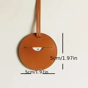Étiquette de bagage ronde en cuir marron pour valise de voyage, diamètre de 5cm.