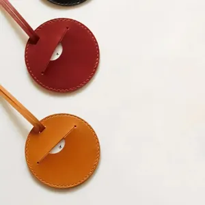 Étiquette de bagage ronde en cuir pour valise de voyage, porte-carte ID de détail.