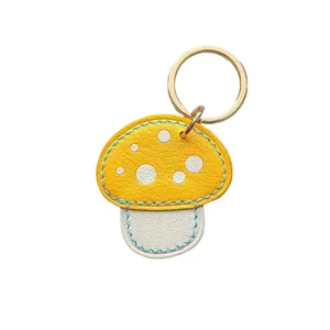 Niedlicher Leder Pilz Schlüsselanhänger, farbblockierender Auto Schlüsselring und Tasche.