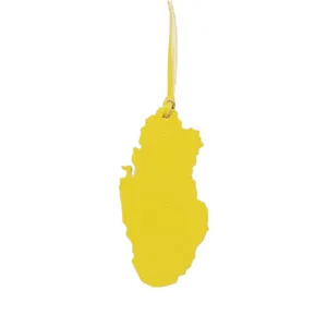 Yellow leather Qatar map bag charm, stylish travel souvenir pendant for purses and keys.