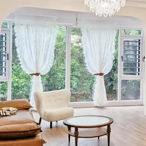 Detail view of adjustable leather curtain tiebacks, elegant strap for modern home decor.