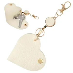 Estuche para llaves de cuero en forma de corazón estilo japonés con llavero retráctil para coche