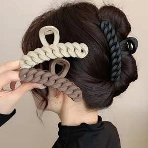 Detailed view of matte chain design hair claw, elegant hair accessory for daily styling.