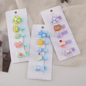 Cute baby hair clips set with colorful resin cartoon bear and flower designs for sweet little girls.
