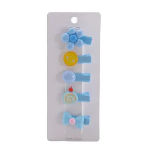 Cute blue baby hair clips set for girls, sweet cartoon hairpins on display card, safe hair accessories.