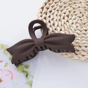 Large brown bow hair claw clip, solid color matte acrylic shark clip for daily hair styling.