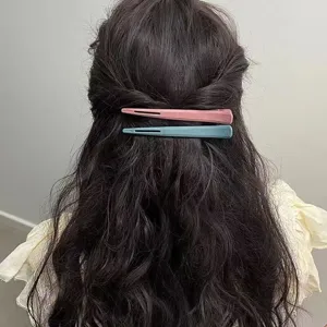 Professional long sectioning hair clips for salon styling and professional hairdressing use.
