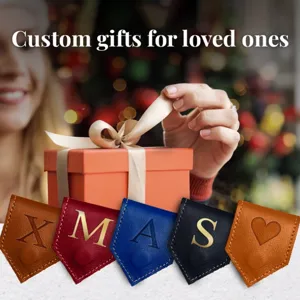 Detailed view of leather magnetic bookmarks with custom XMAS letters and heart design.