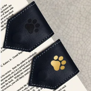 Magnetic leather corner bookmark with cute paw print design, elegant reading page marker for books.