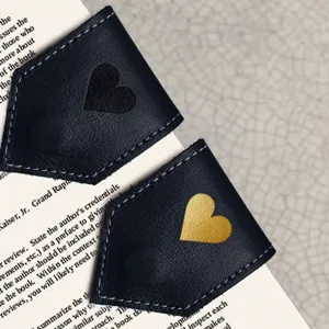 Leather magnetic corner bookmark page clips with cute heart design for reading lovers.