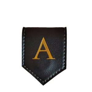 Black leather magnetic bookmark with gold letter A, diamond shape page marker clip.