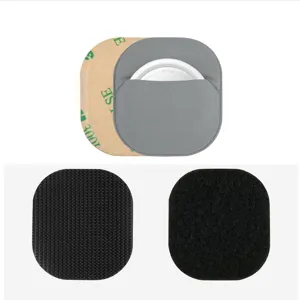 Elastic Lycra tracker protective case with adhesive backing and velcro pads for AirTag.
