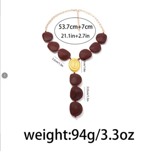 Collana statement geometrica vintage con perline marroni e ciondolo dorato, lunghezza 53+7cm.