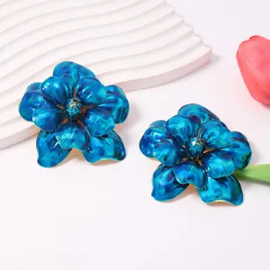 Exquisite blue flower earrings for women, featuring glossy petal design and elegant style.