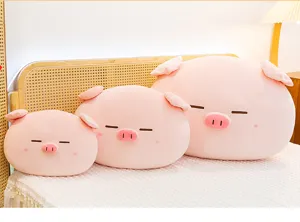Cute pink pig plush pillow, soft stuffed animal cushion for sofa, bedroom and office use.