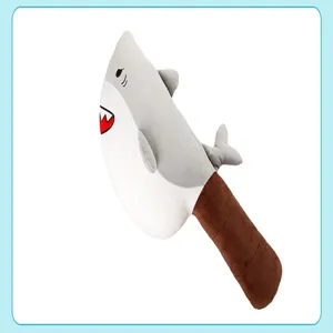 Detailed close-up view of the funny shark knife plush pillow, showing its soft fabric and stitching.