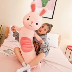 Cute pink long bunny plush pillow, soft stuffed rabbit toy for sleeping and bedroom decor.