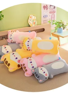 Detailed shot of cute sleeping cat plush pillows arranged nicely on a cozy bed setup.